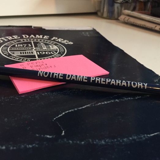 A folder, sticky notes, and a pencil: three basic necessities for the first day back to school at Notre Dame Preparatory School.