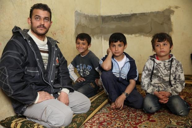 A Syrian family who fled to Lebanon, and are now living as a family of ten in an unexpected, confined space.