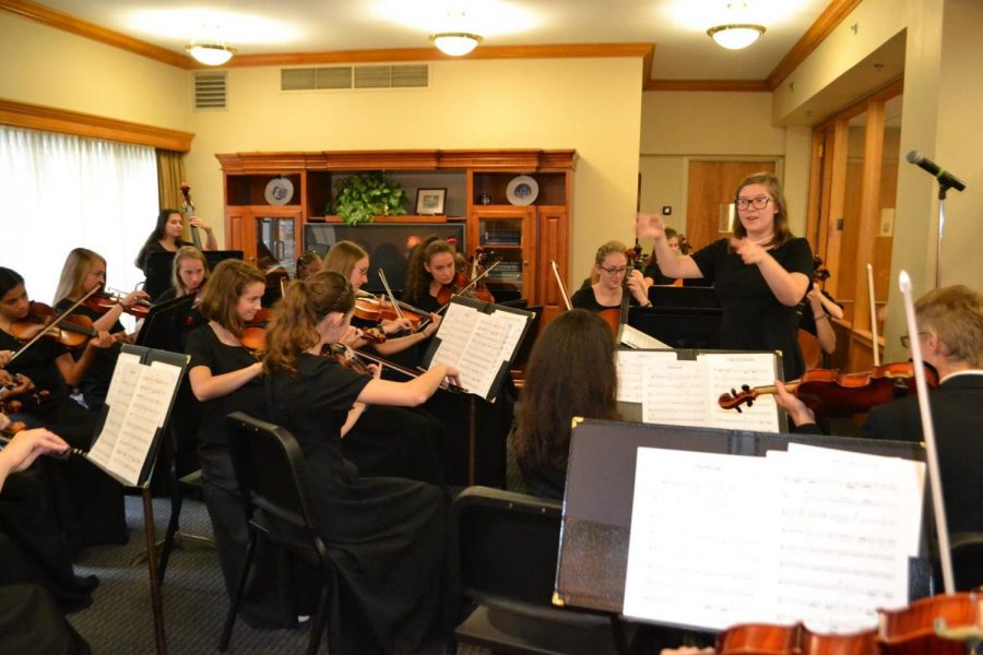 The NDP String Orchestra prepares to play at Open House 2017