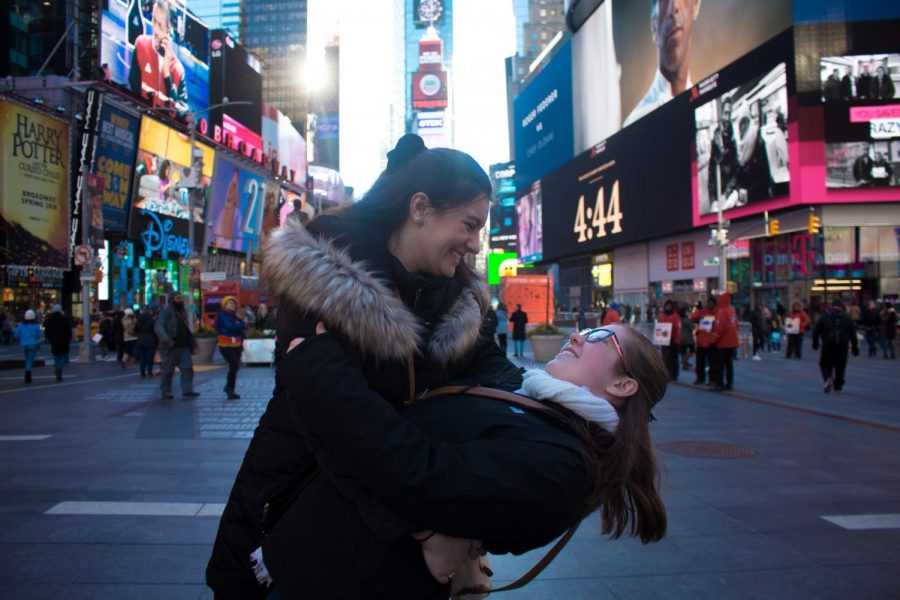 Maddie Saldana (left) and Anna Zittle (right) in Times Square, NYC