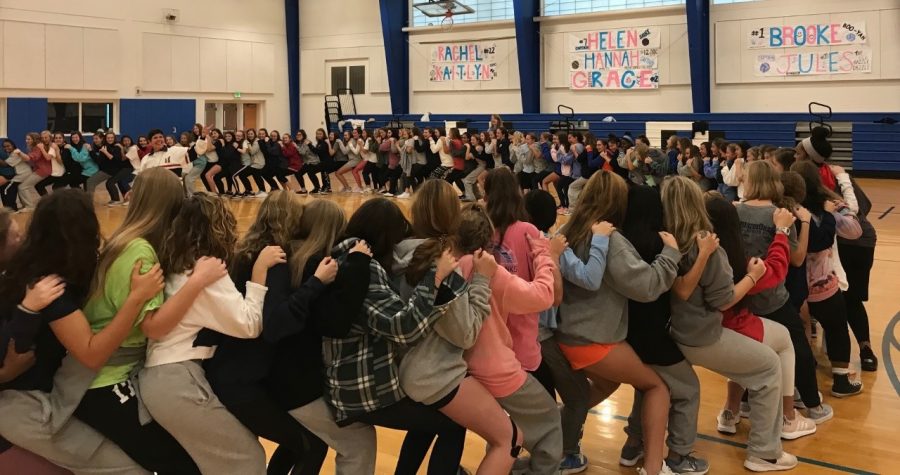 Students take part in a trust-building exercise during their retreat.