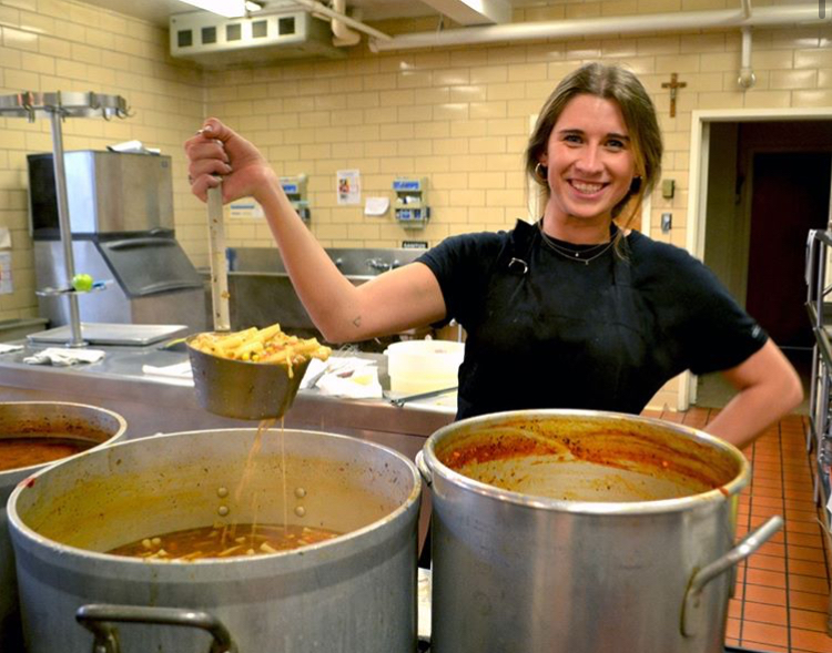 Ms. Majchrzak is busy preparing the soup!