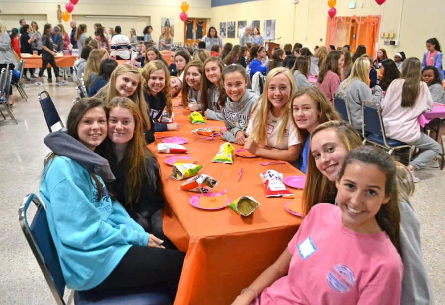 Members of the Class of 2023 gather in the dining room after retreat.